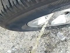 Quick piss surpassing truck tire