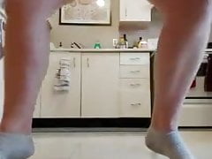 Girl pissing on the kitchen stun