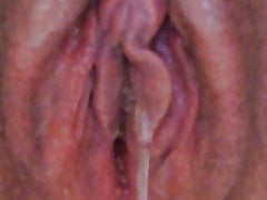 Wringing wet pussy pee